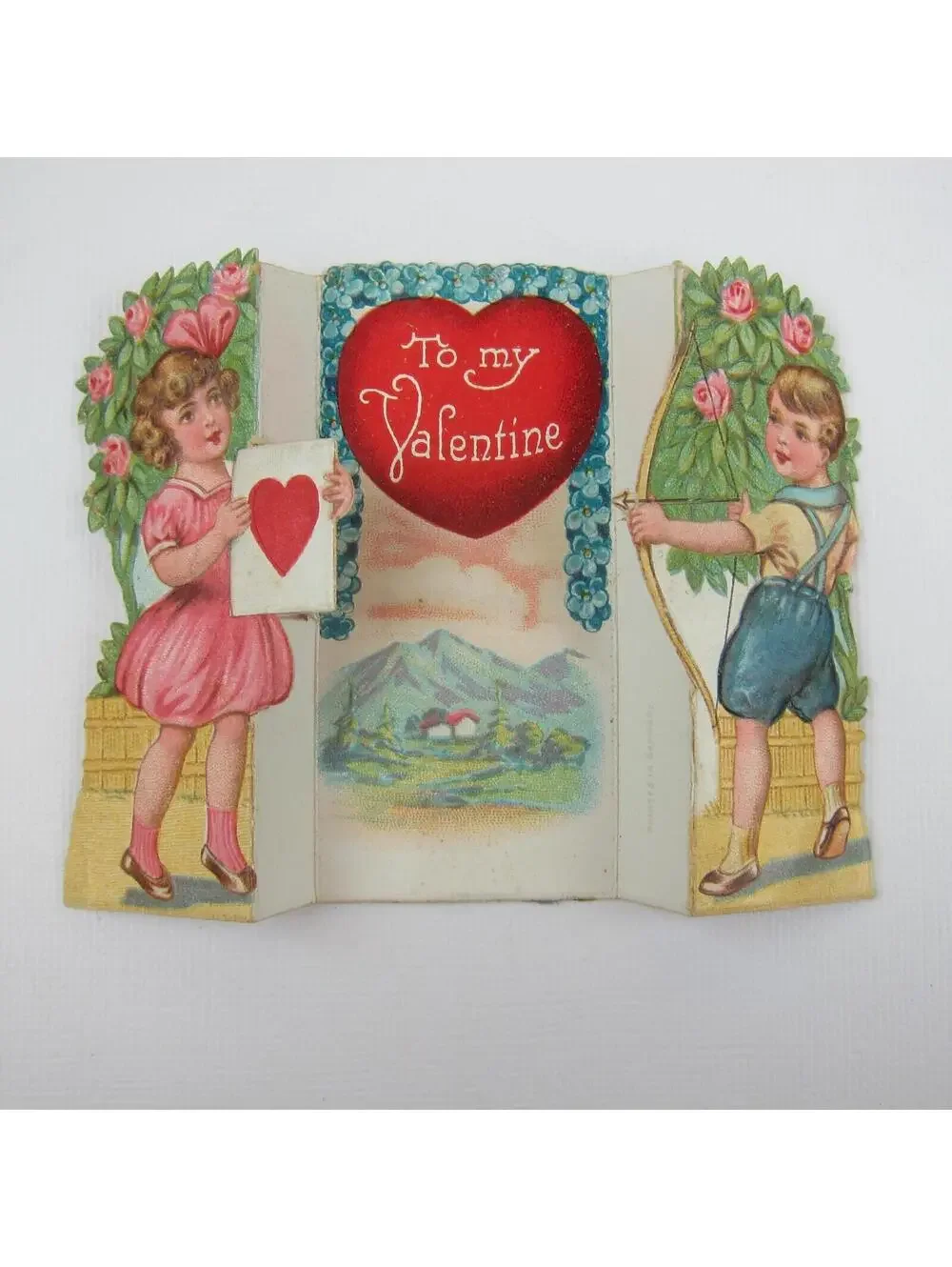 Vintage Valentine Boy Shoots Arrow Girl Pink Dress Holds Heart Target Mountains
